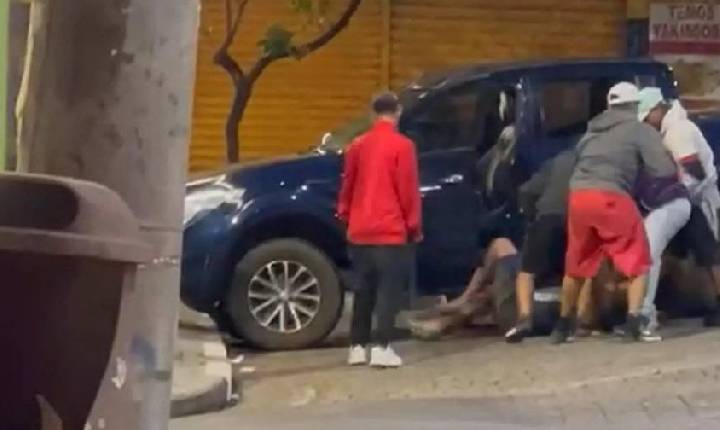 Imagem exclusiva mostra início de confusão em que homem foi espancado e atropelado em Bom Jesus dos Perdões